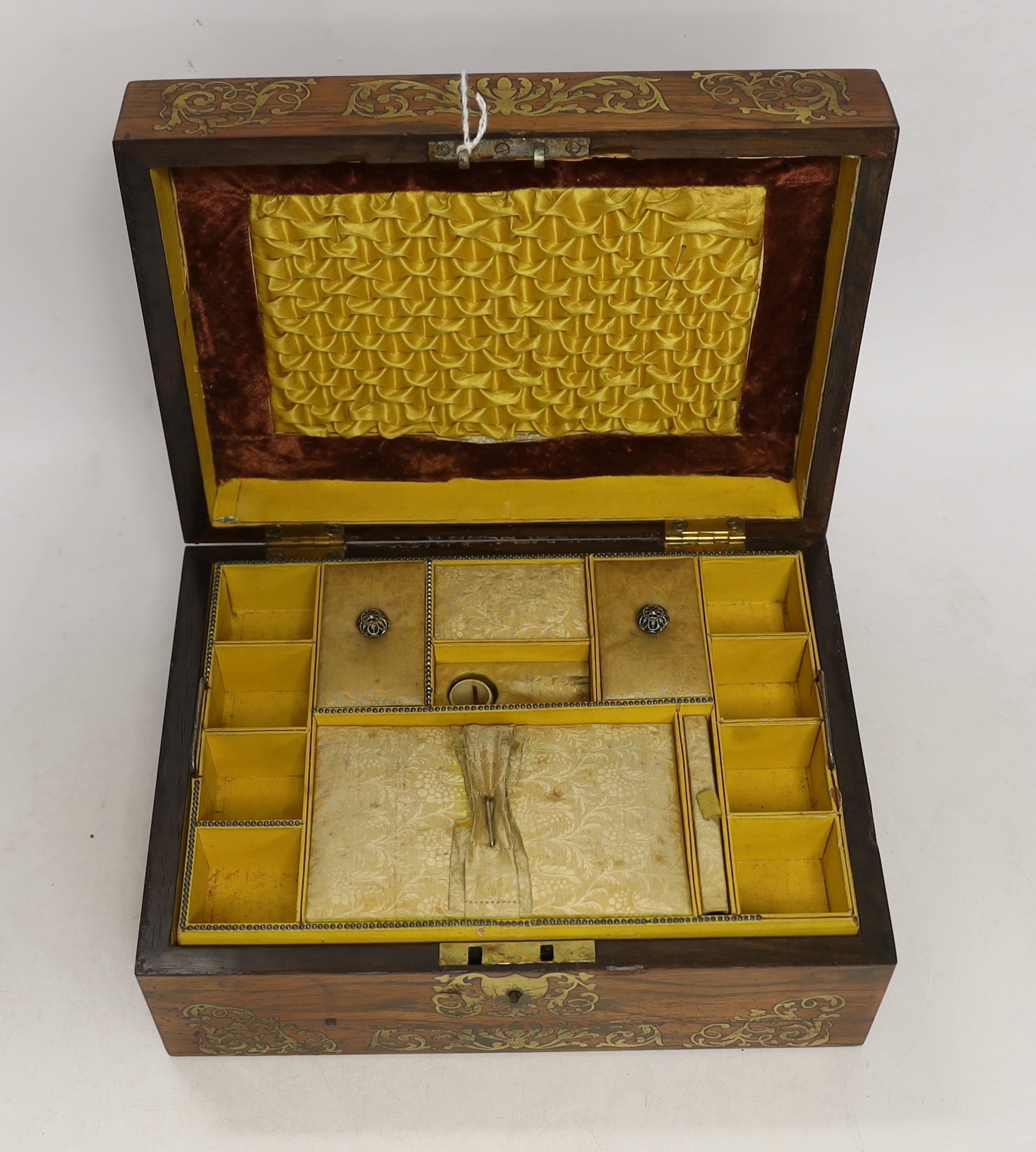 A William IV brass inset rosewood work box with fitted interior, 25cm wide